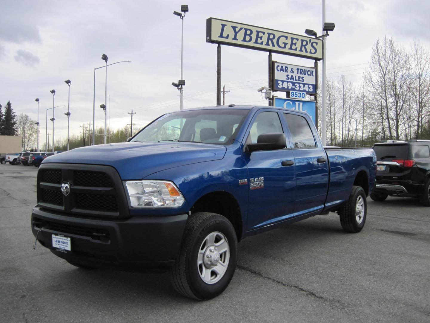 2014 blue /gray RAM 2500 Tradesman Crew Cab 4WD (3C6TR5HT1EG) with an 5.7L V8 OHV 16V engine, automatic transmission, located at 9530 Old Seward Highway, Anchorage, AK, 99515, (907) 349-3343, 61.134140, -149.865570 - Low miles on the Ram 2500 come take a test drive - Photo#0